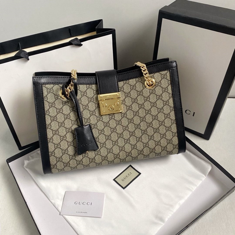 G*u*i shopping bags